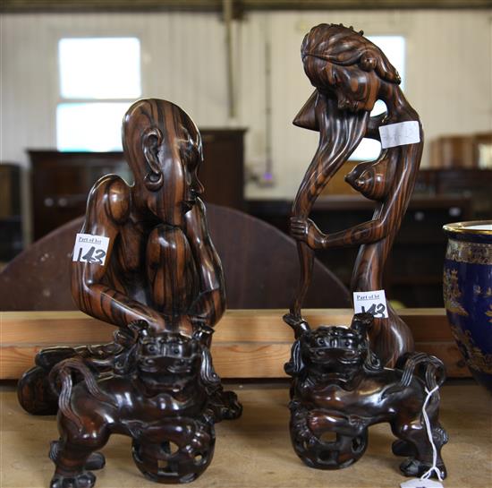 Four South East Asian macassar ebony figures